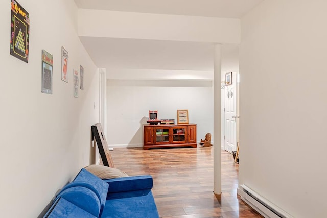 3114 Fairfax Ter, East Stroudsburg, PA 18301 - sitting room featuring wood finished floors and baseboard heating