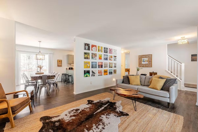 3114 Fairfax Ter, East Stroudsburg, PA 18301 - living room with stairway, baseboards, and dark wood finished floors