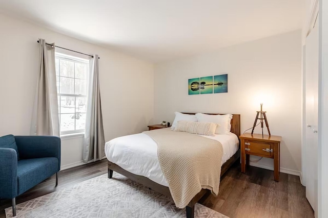 3114 Fairfax Ter, East Stroudsburg, PA 18301 - bedroom featuring multiple windows, baseboards, and wood finished floors