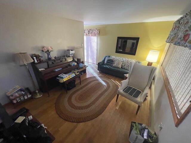 sitting room featuring wood finished floors