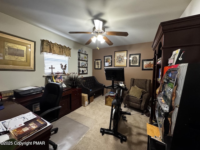 office area featuring ceiling fan and light colored carpet