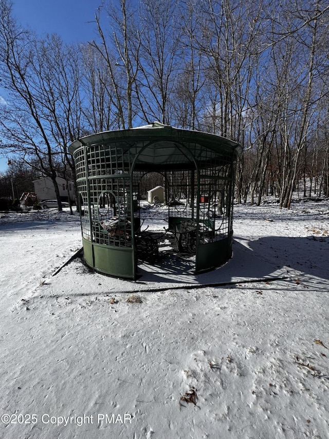 view of snow covered parking