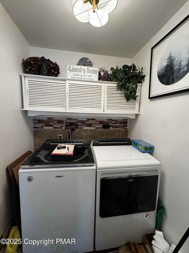 laundry area featuring laundry area and washing machine and clothes dryer