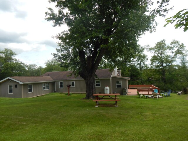3277 State St, White Haven, PA 18661 - back of property featuring a yard and a chimney