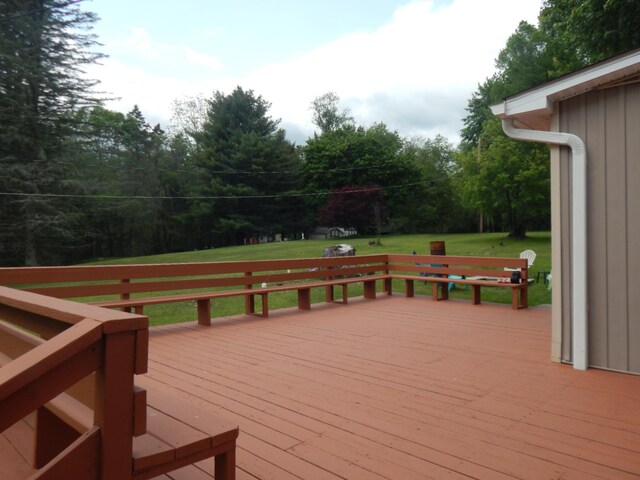 3277 State St, White Haven, PA 18661 - deck with a lawn and view of wooded area