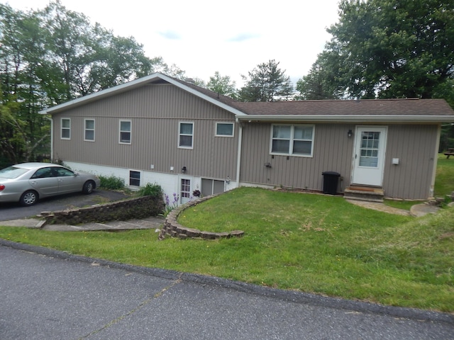 3277 State St, White Haven, PA 18661 - view of front of home featuring a front yard, entry steps, and a shingled roof