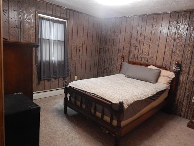 3277 State St, White Haven, PA 18661 - bedroom with a baseboard heating unit, carpet floors, and wood walls