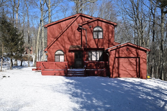 rustic home with a garage and a porch