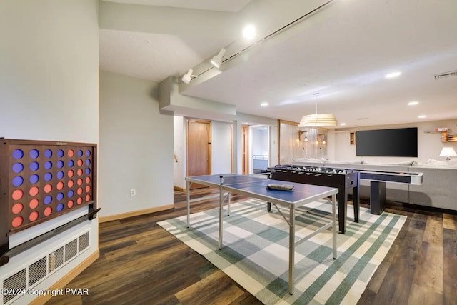 recreation room featuring baseboards, visible vents, wood finished floors, and recessed lighting