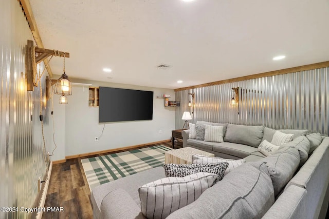 living area featuring recessed lighting, wood finished floors, visible vents, and baseboards