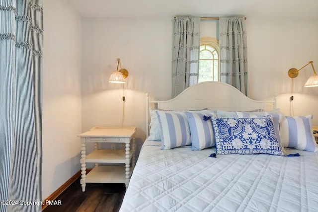 bedroom featuring baseboards