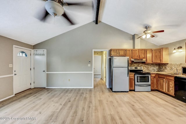 kitchen featuring appliances with stainless steel finishes, sink, vaulted ceiling with beams, and ceiling fan