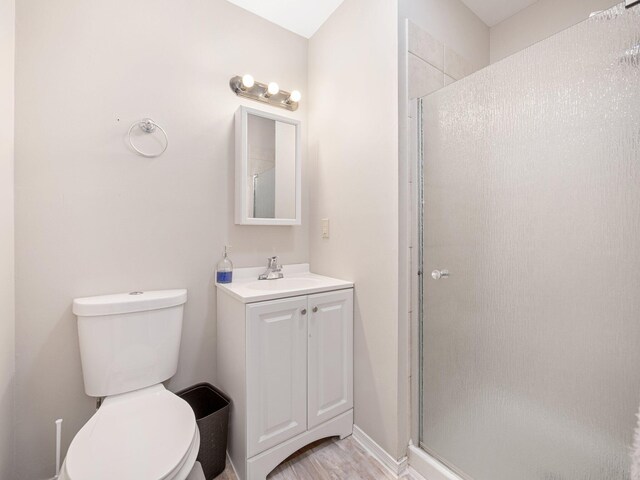 1533 Black Birch Way, Tobyhanna, PA 18466 - bathroom featuring a shower stall, vanity, and wood finished floors