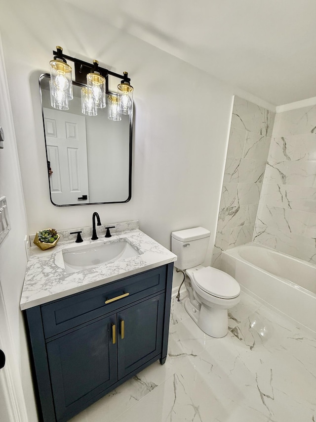 bathroom with vanity, toilet, marble finish floor, and shower / washtub combination