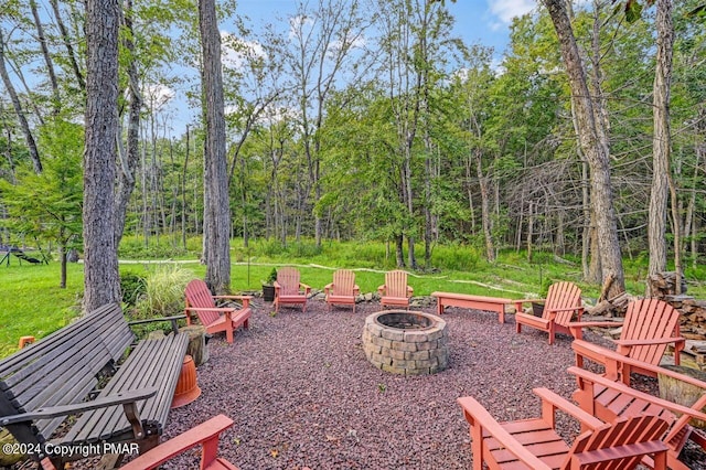 view of patio with an outdoor fire pit