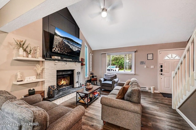 living room with baseboards, stairway, dark wood-style flooring, vaulted ceiling, and a fireplace