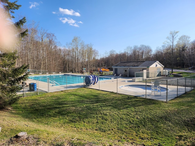 457 Maxatawny Dr, Pocono Lake, PA 18347 - community pool featuring a patio and view of wooded area
