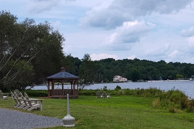 457 Maxatawny Dr, Pocono Lake, PA 18347 - surrounding community with a gazebo, a water view, a lawn, and a view of trees