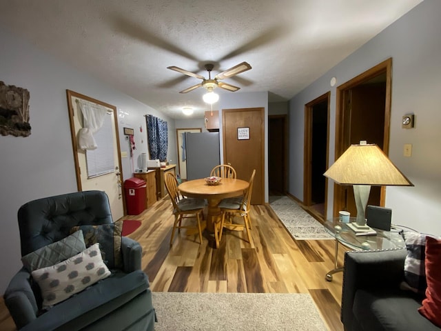 457 Maxatawny Dr, Pocono Lake, PA 18347 - dining area featuring light wood finished floors and ceiling fan