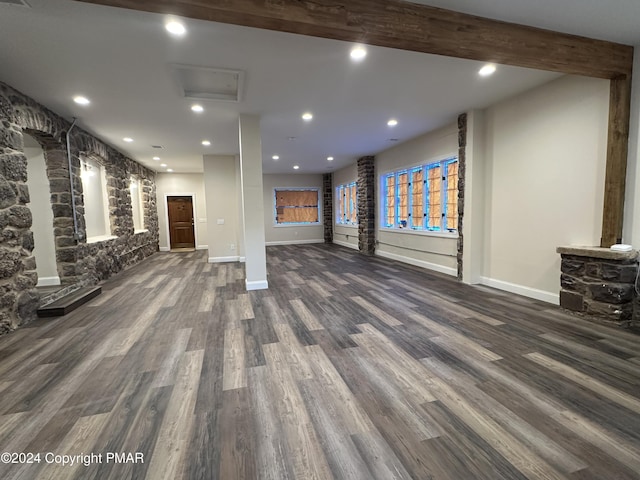interior space featuring baseboards, dark wood-style flooring, and recessed lighting