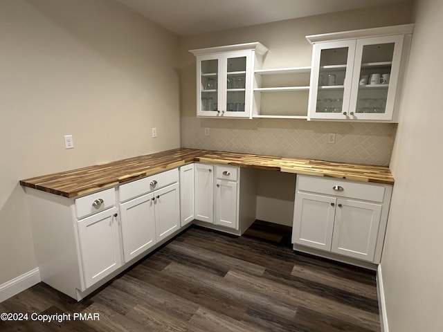 kitchen featuring dark wood-style flooring, a peninsula, wood counters, tasteful backsplash, and open shelves
