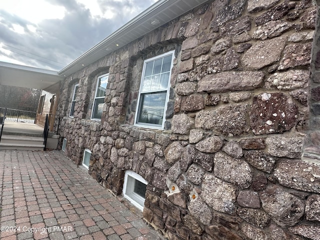 view of home's exterior featuring stone siding