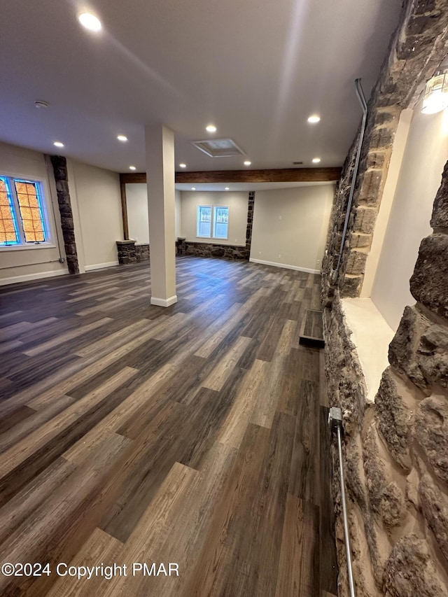 basement with recessed lighting, baseboards, and wood finished floors