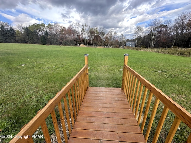 view of home's community featuring a yard