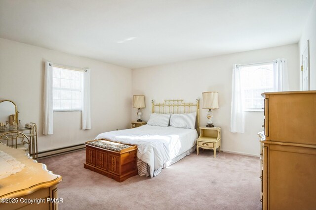 carpeted bedroom with baseboard heating