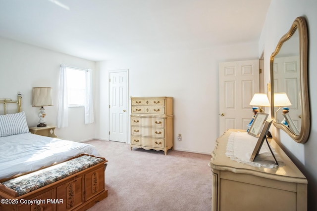 bedroom with light colored carpet