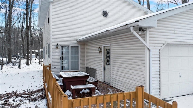 view of snow covered deck