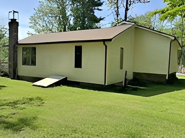 417 Lower Swiftwater Rd, Cresco, PA 18326 - back of property featuring a yard and stucco siding