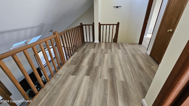 hall featuring wood finished floors