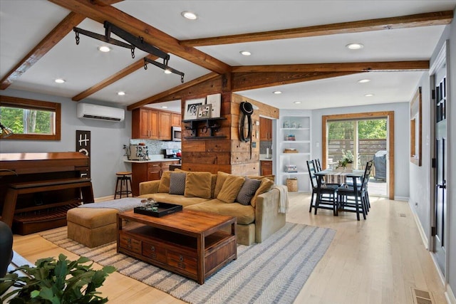 262 Marilou Ln, Bartonsville, PA 18321 - living area with a wall mounted air conditioner, healthy amount of natural light, light wood-style flooring, and recessed lighting