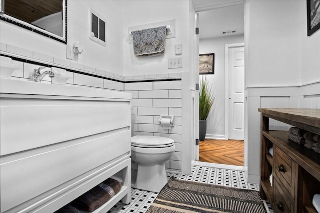 262 Marilou Ln, Bartonsville, PA 18321 - bathroom with vanity, wainscoting, and tile walls