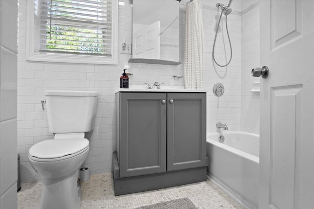 262 Marilou Ln, Bartonsville, PA 18321 - bathroom with vanity, shower / bathtub combination with curtain, and tile walls