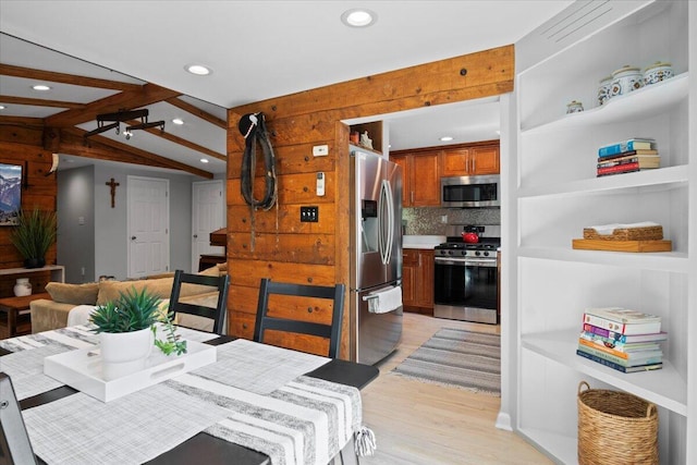 262 Marilou Ln, Bartonsville, PA 18321 - dining area featuring wooden walls, light wood-style floors, and recessed lighting