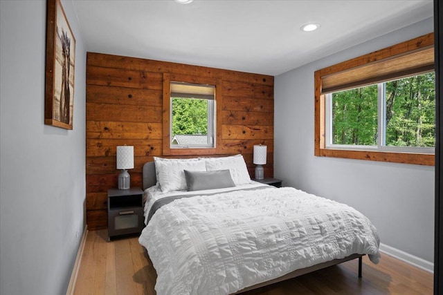 262 Marilou Ln, Bartonsville, PA 18321 - bedroom featuring light wood-style floors, recessed lighting, and wooden walls