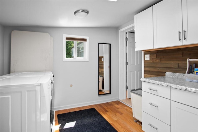 262 Marilou Ln, Bartonsville, PA 18321 - laundry room with separate washer and dryer, light wood-style flooring, and cabinet space