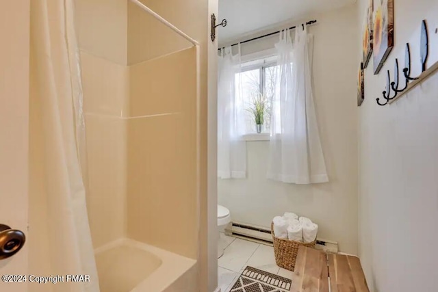 bathroom with shower / bath combo, a baseboard radiator, and toilet