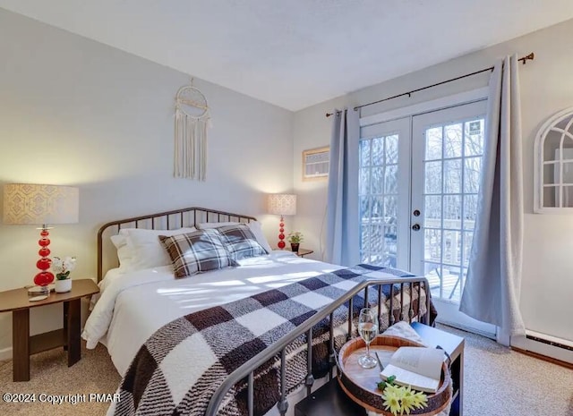 bedroom with access to exterior, multiple windows, carpet flooring, and french doors