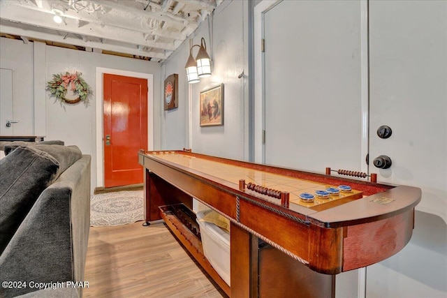 playroom with light wood-type flooring