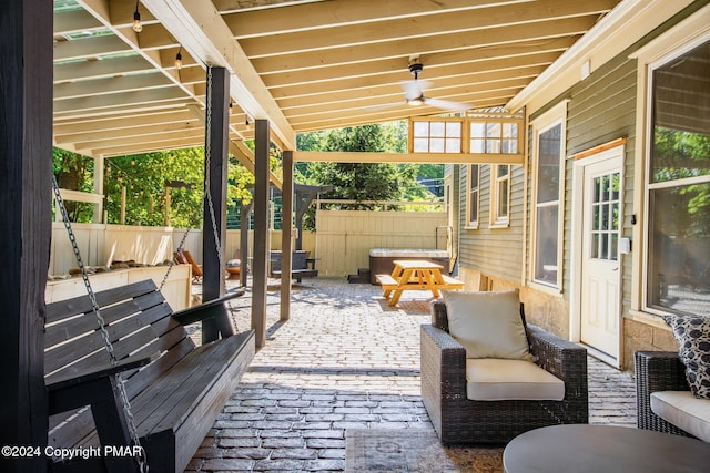 view of patio / terrace with a fenced backyard and a ceiling fan