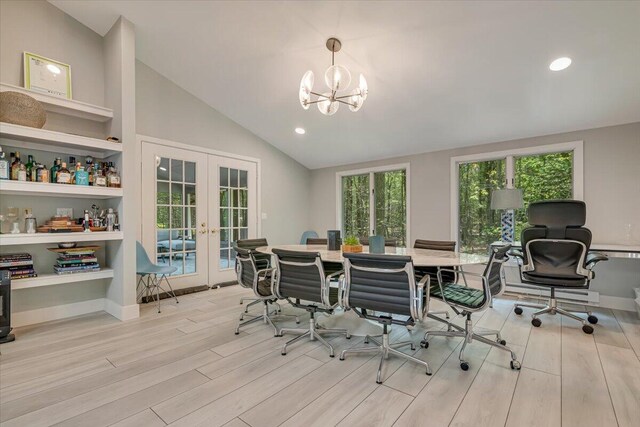 171 Flintlock Trl, Pocono Pines, PA 18350 - kitchen with appliances with stainless steel finishes, light wood-style flooring, backsplash, and under cabinet range hood