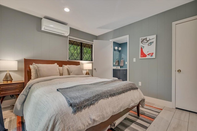 171 Flintlock Trl, Pocono Pines, PA 18350 - bedroom featuring a wall mounted air conditioner, a decorative wall, and recessed lighting