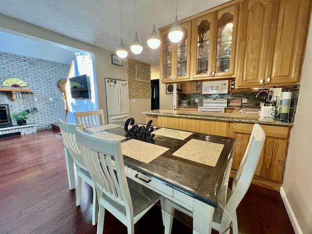 5144 Hounds Ear Rd, Tobyhanna, PA 18466 - dining space featuring dark wood-type flooring and baseboards