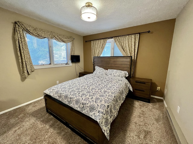 5144 Hounds Ear Rd, Tobyhanna, PA 18466 - bedroom featuring baseboards, multiple windows, carpet, and a textured ceiling