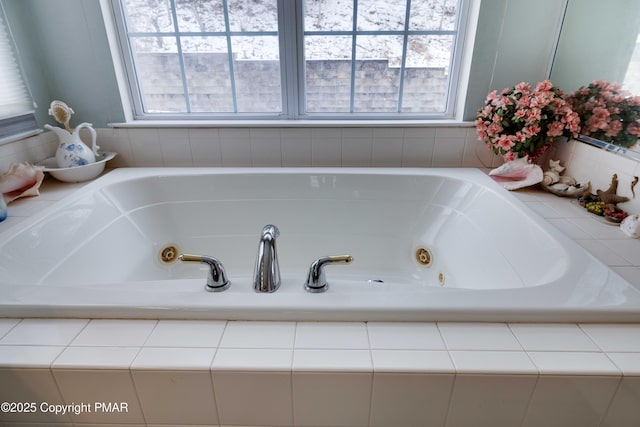 bathroom with a jetted tub