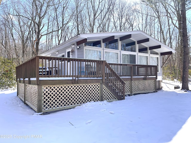 view of front of house featuring a wooden deck