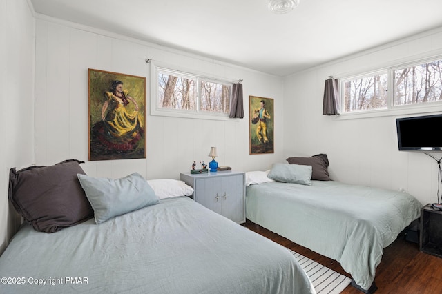 bedroom featuring dark wood-type flooring